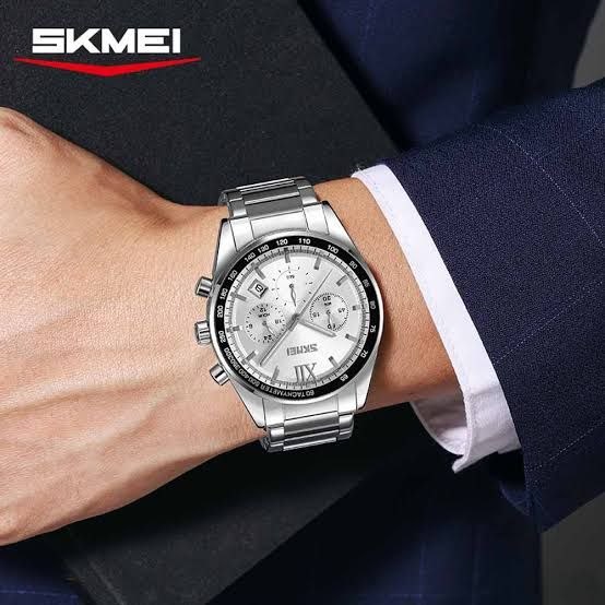 ساعت مچی مردانه skmei  Skmei 9096 New Design   موتور ژاپن ۳موتور کرنوگراف نمایش ایام ماه ضدآب 3Atm بند استیل شیشه کریستال ضدخش قفل استیل پروانه‌ای