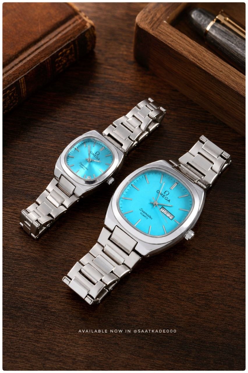 ست ساعت زنانه و مردانه OMEGA Couple Watch New Design  ساعت ست بند استیل از برند لاکچری "امگا"  موتور شرکتی گرید A++ نمایشگر ایام ماه و هفته شیشه کریستال نشکن  قاب پشت و بند استیل رنگ ثابت  قفل استیل فشاری